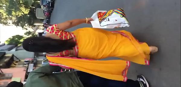  Cute structure of aunty in yellow saree